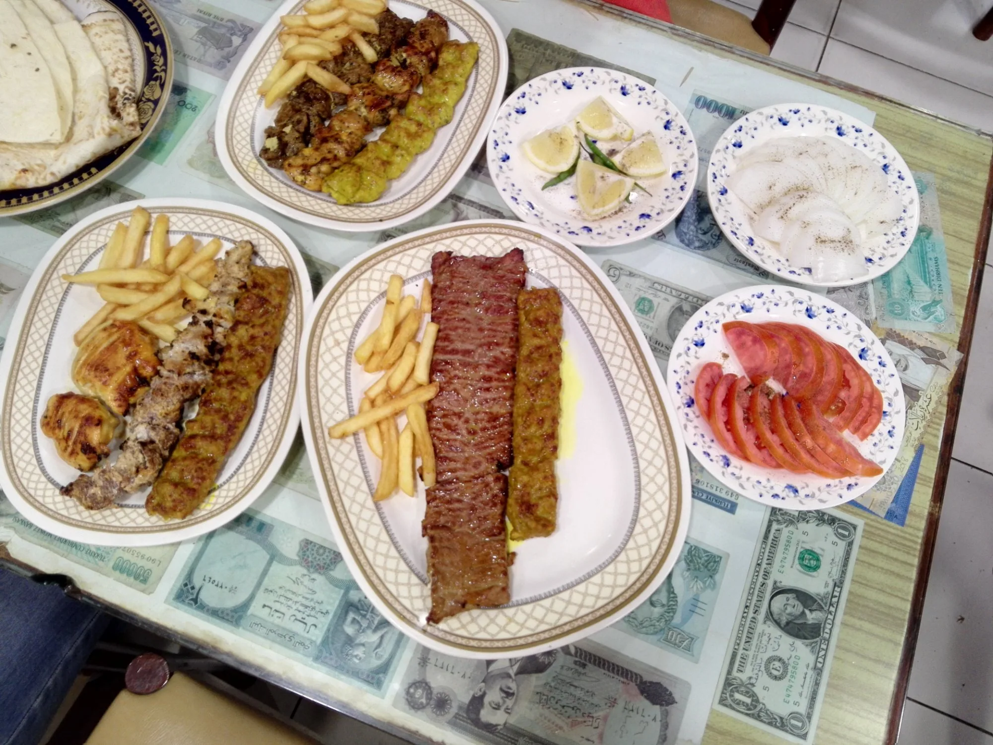 The Sultani platter — tenderloin barg next to koubideh with rice and fries