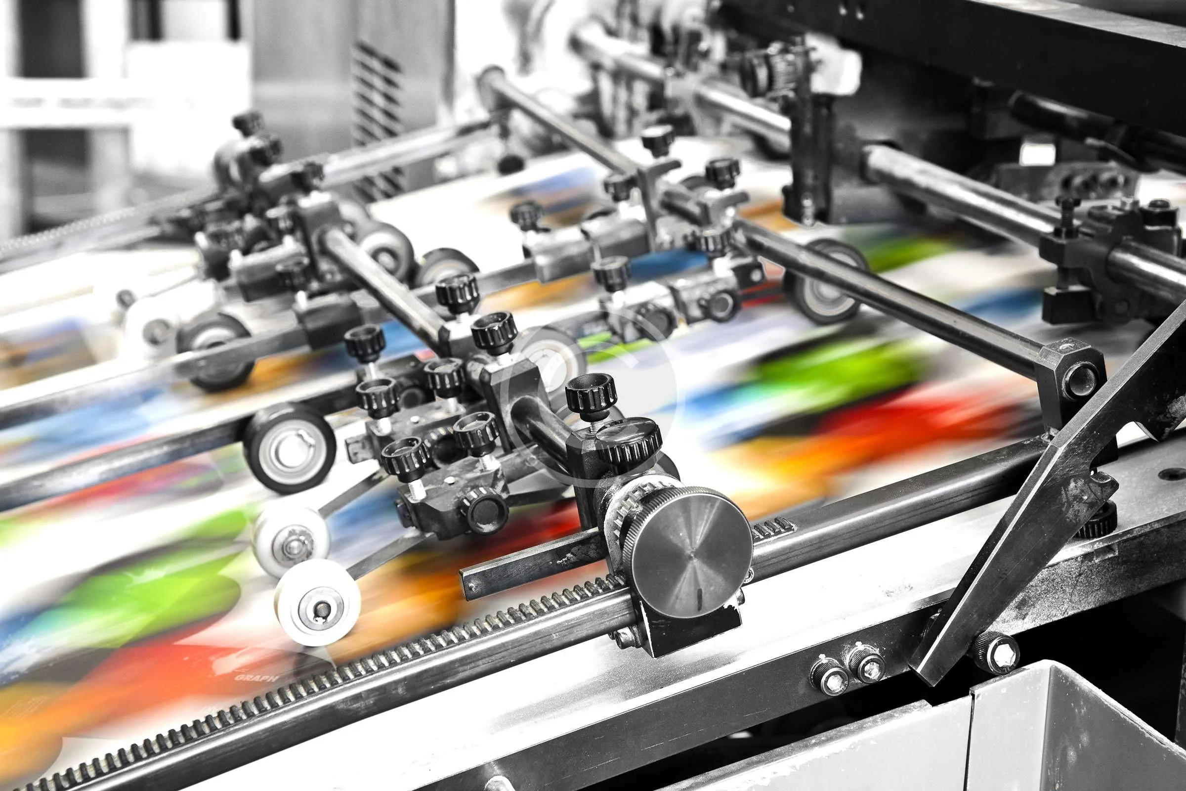 High-speed print press running a colorful job