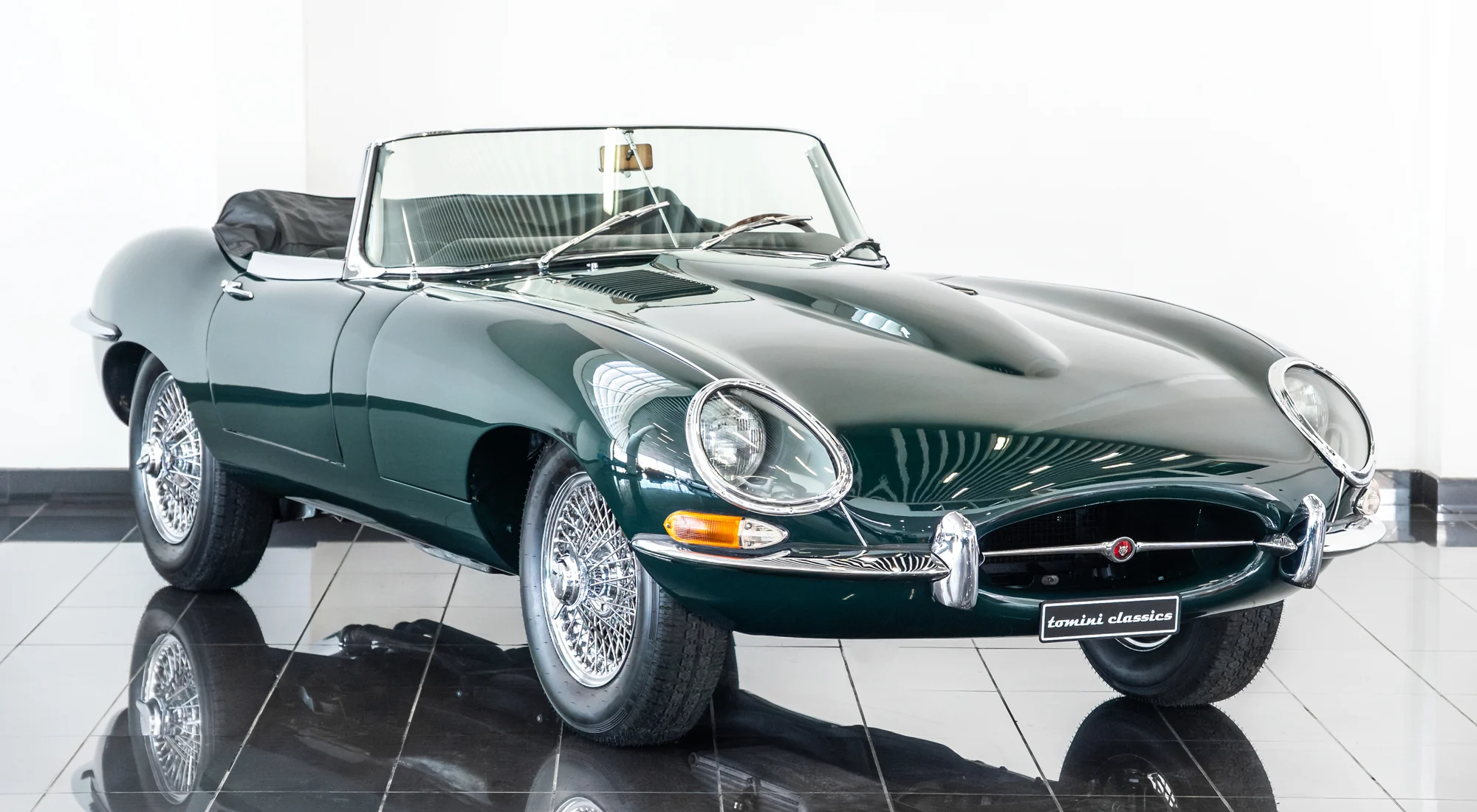 Jaguar E-Type Roadster in green, sold