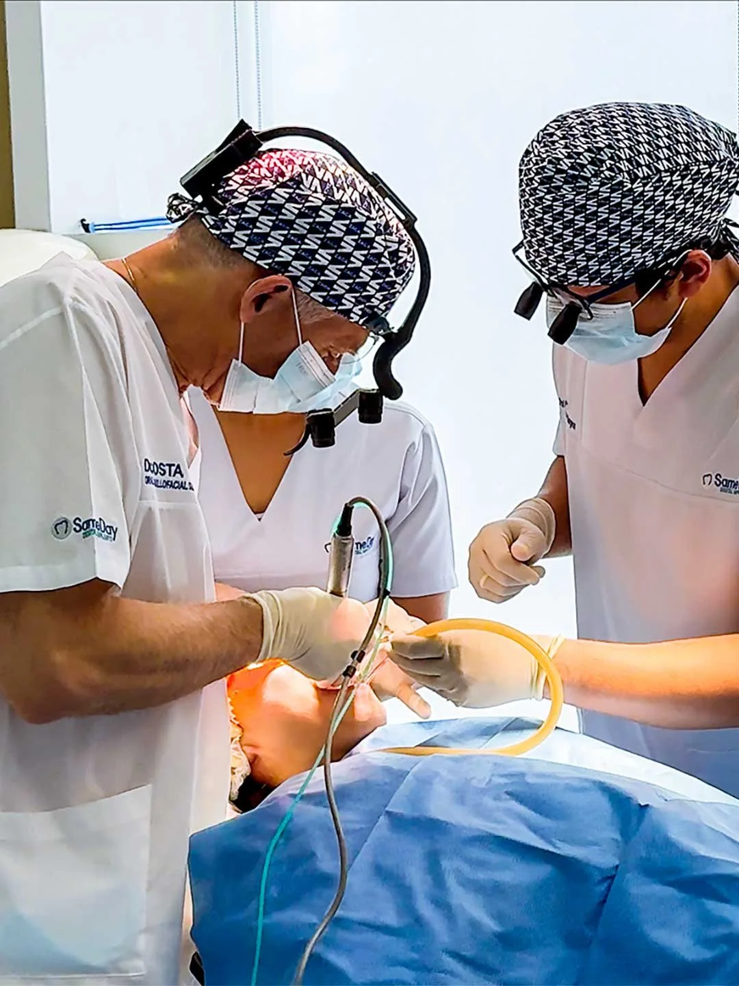 Dr. Costa Nicolopoulos during zygomatic implant surgery