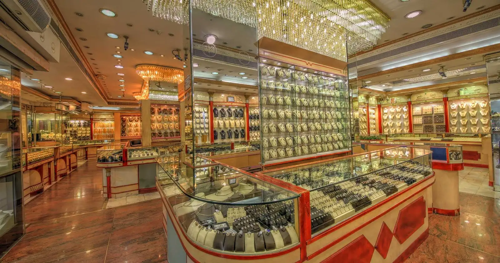 Interior of the Al Mignas showroom, glass cabinets full of gold jewellery