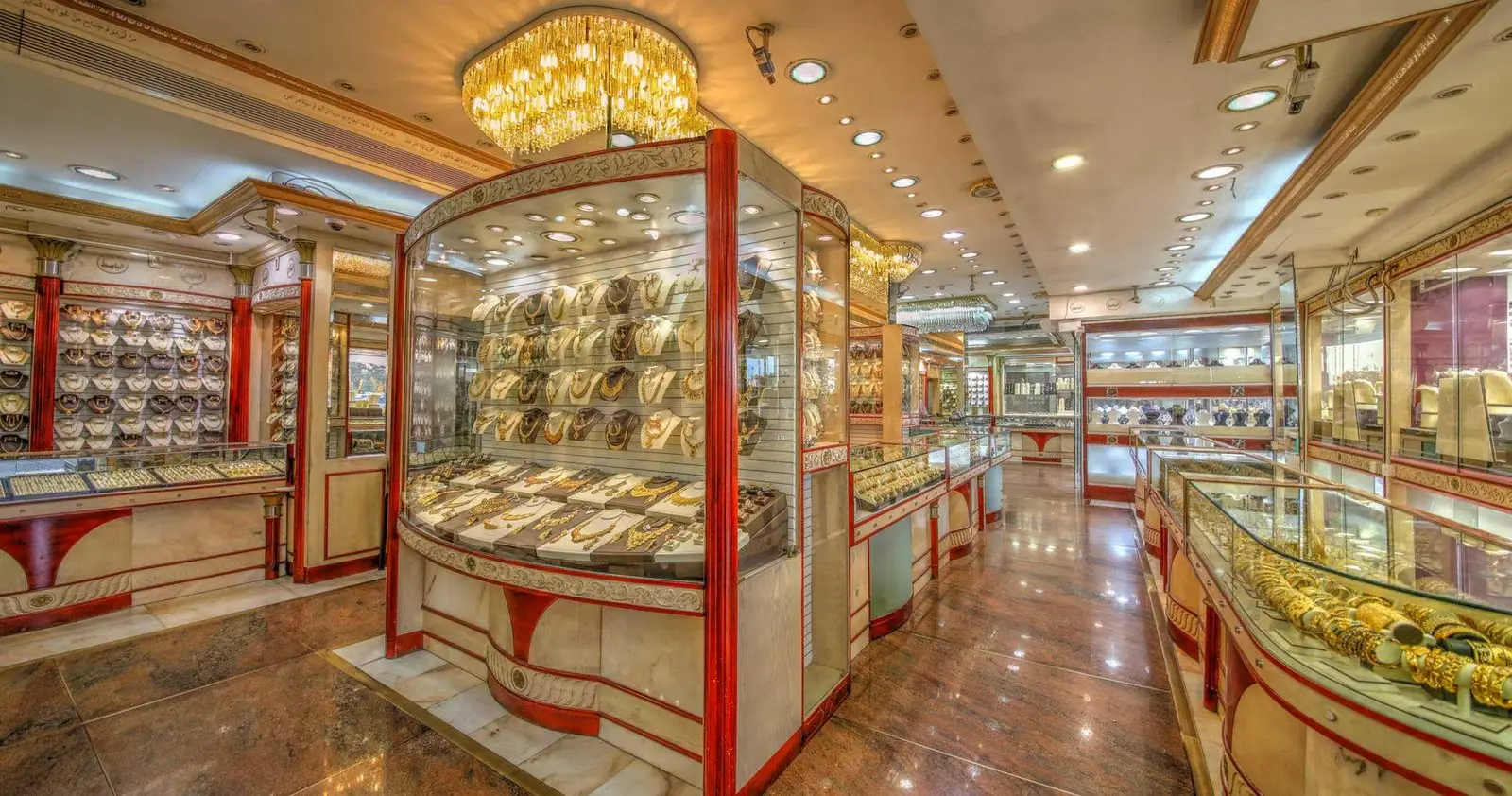 Showroom aisle with gold bangle displays