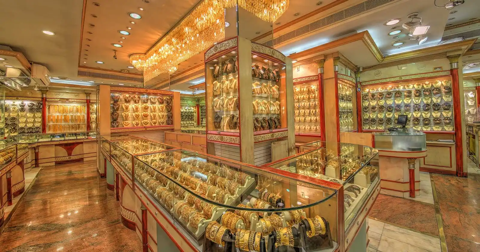 Gold jewellery cabinets and chandeliers