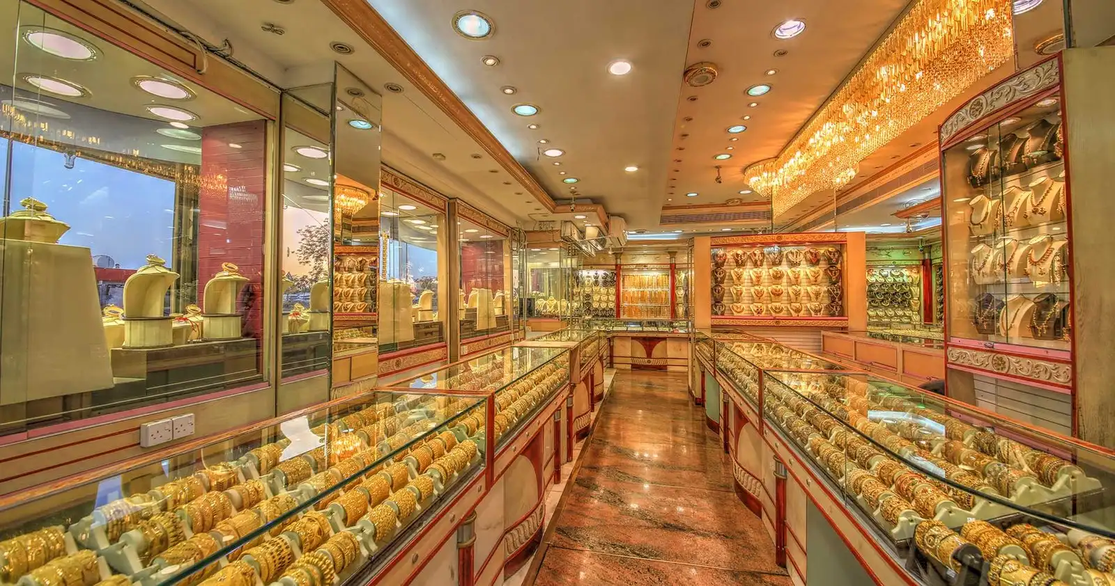 Wall displays of gold necklaces