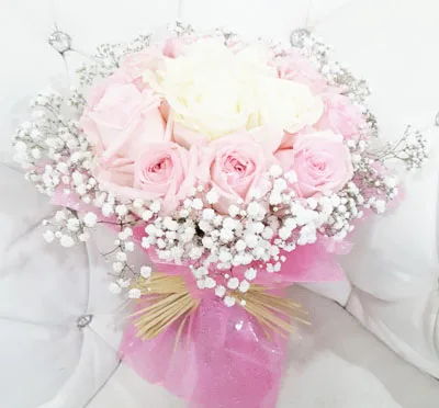 Pink roses with white calla lilies