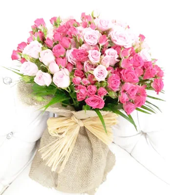 White tulips in a clear glass vase