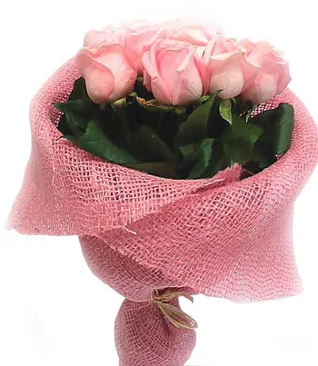 Red and white roses in a circular bouquet
