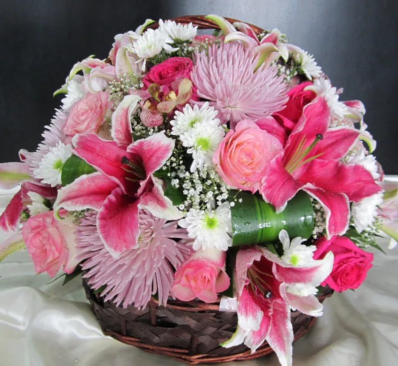 Pink spray roses in burlap wrap