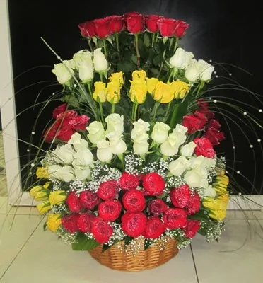 Lush pink lily and rose basket arrangement