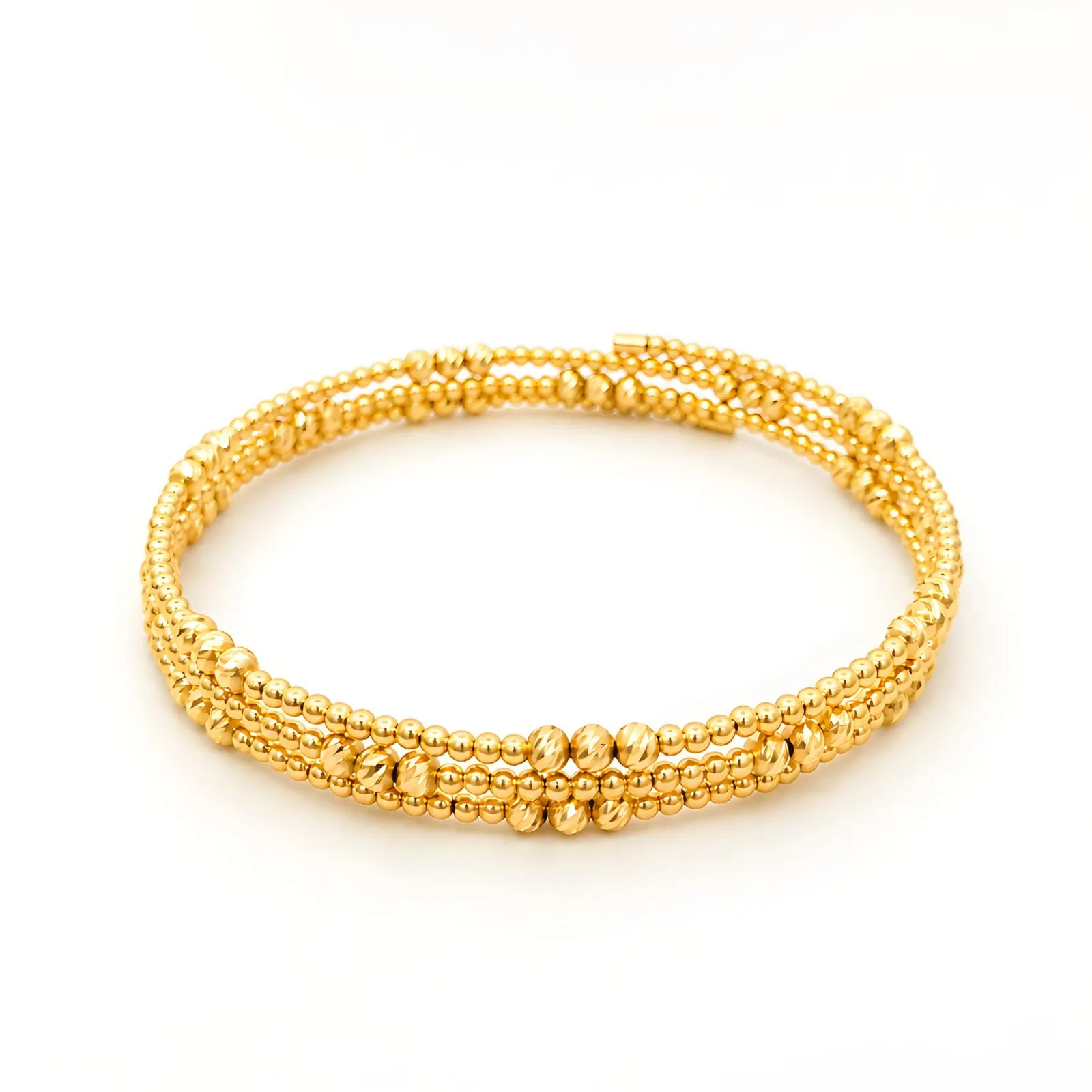 Beaded gold bangle detail