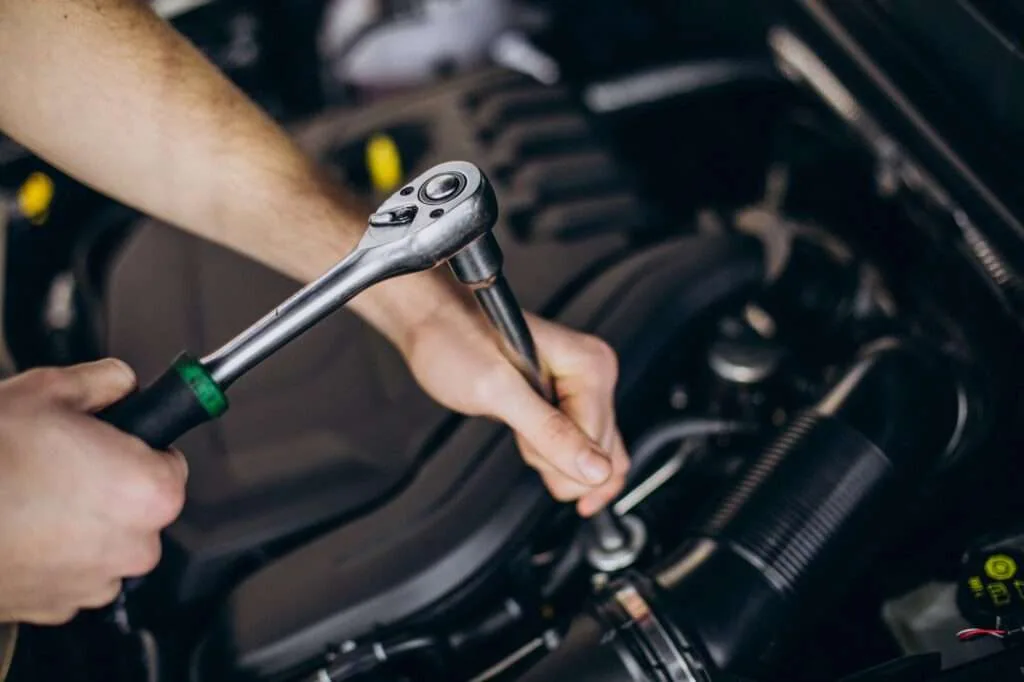 Technician working in the Detail Guys workshop