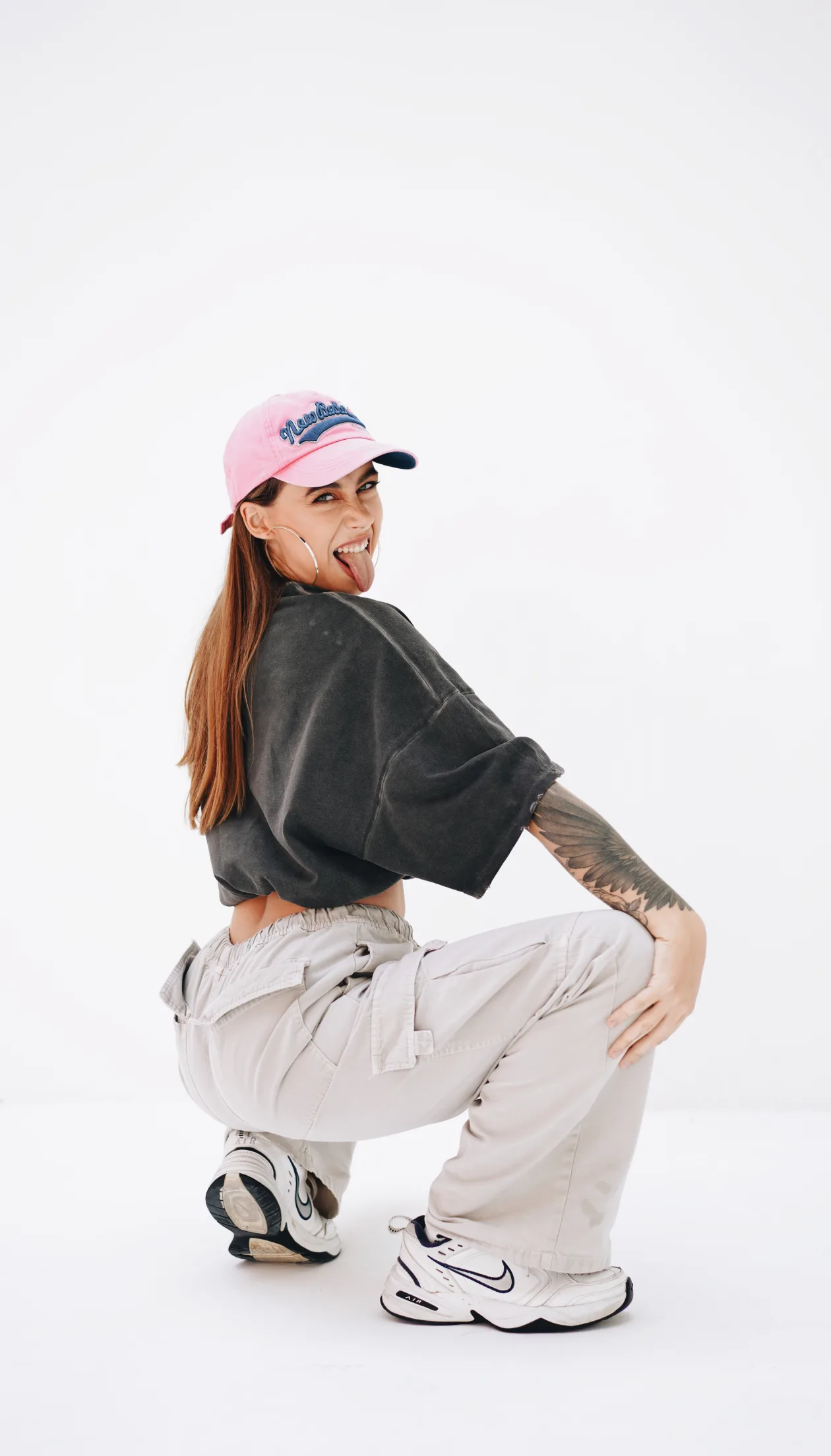 Dancer in a cap and casual streetwear