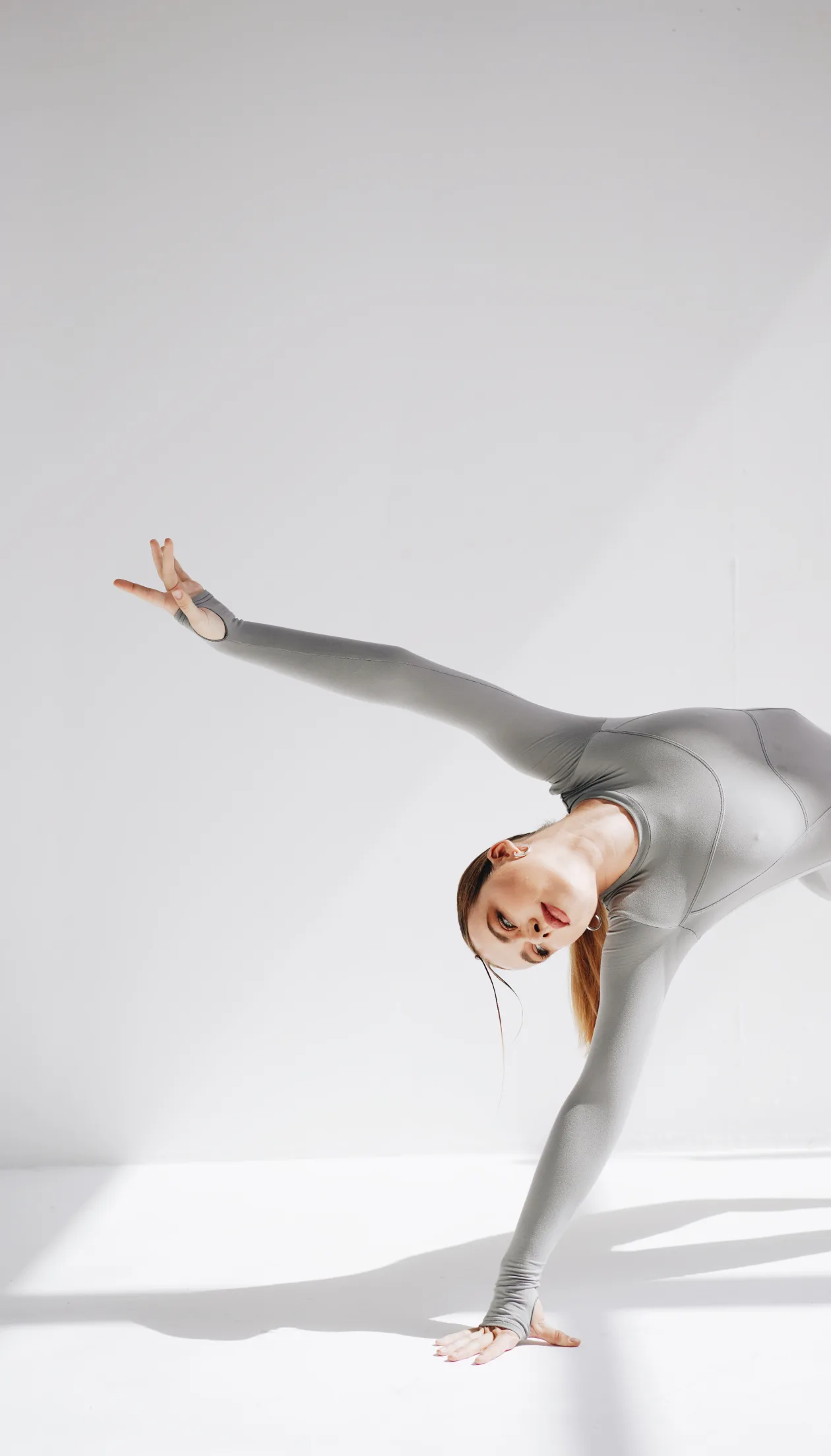 Dancer in a flowing stretch