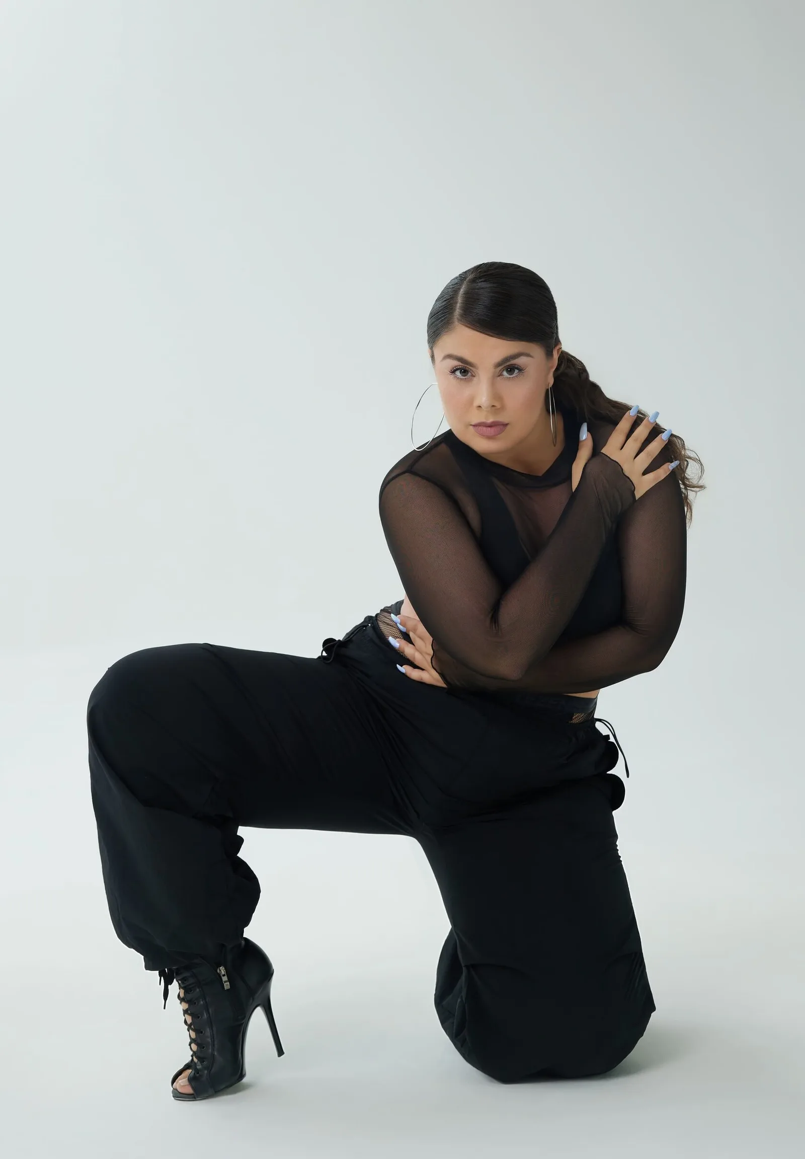 Dancer in black with a bold attitude