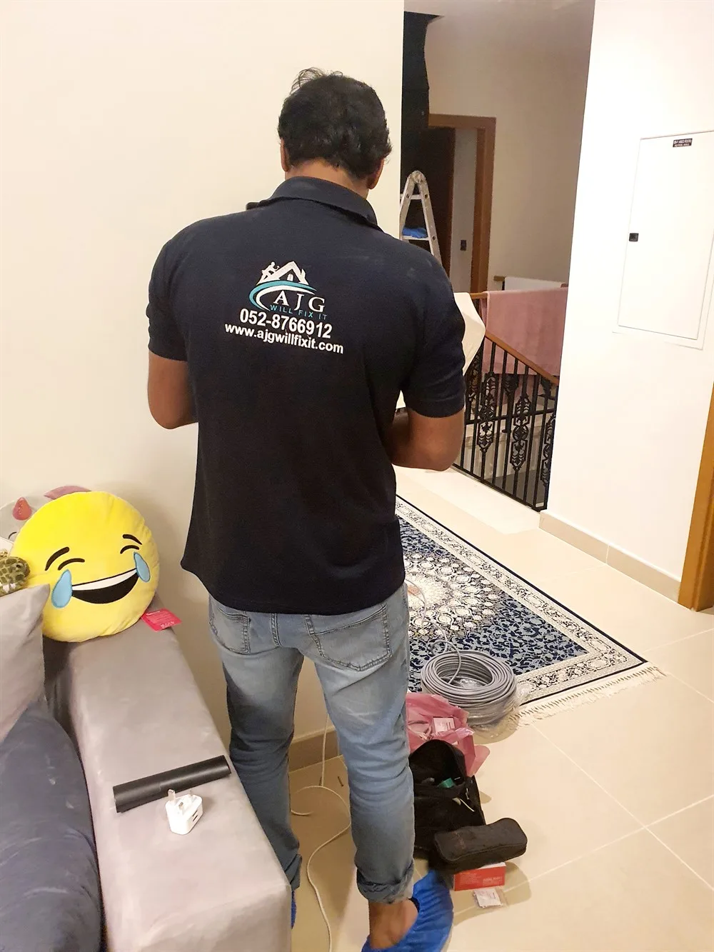 AJG technician carrying out villa electrical work