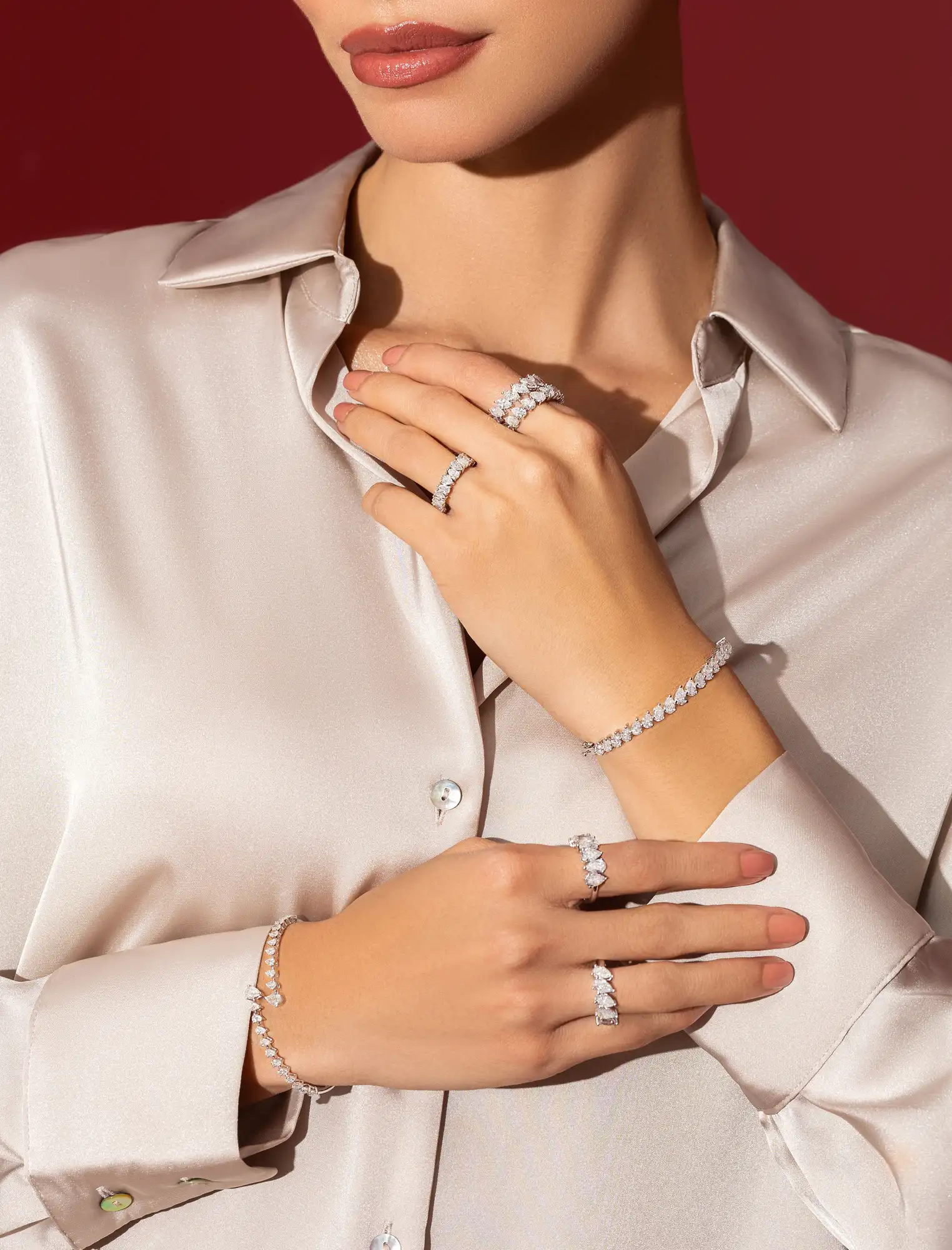 Model wearing a Solitaire Jewels diamond necklace and earrings