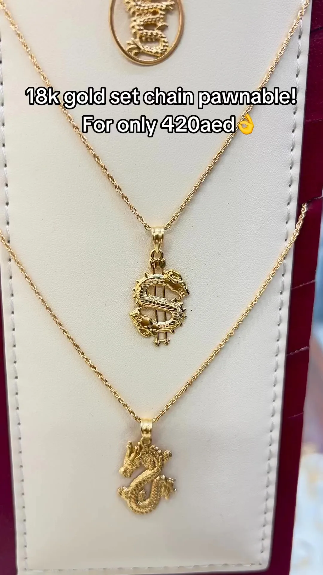 Gold dragon pendants on fine chains