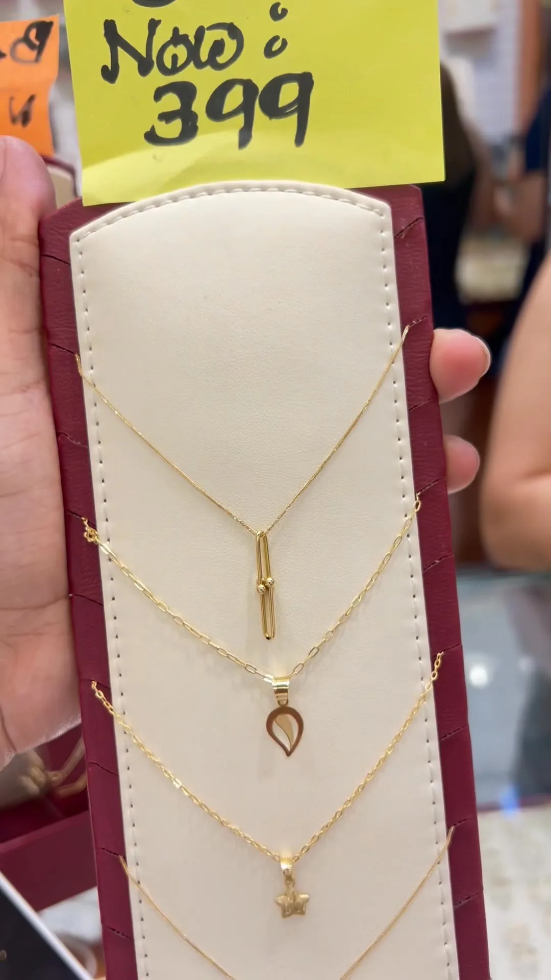 Fine gold necklaces with small pendants