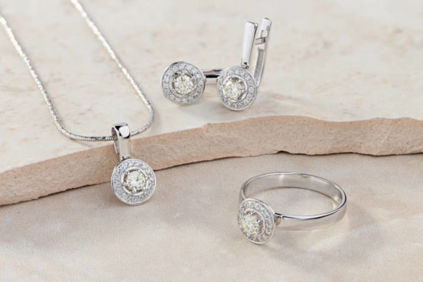 Diamond-set white-gold pendant, earrings and ring from MRM Jewellery