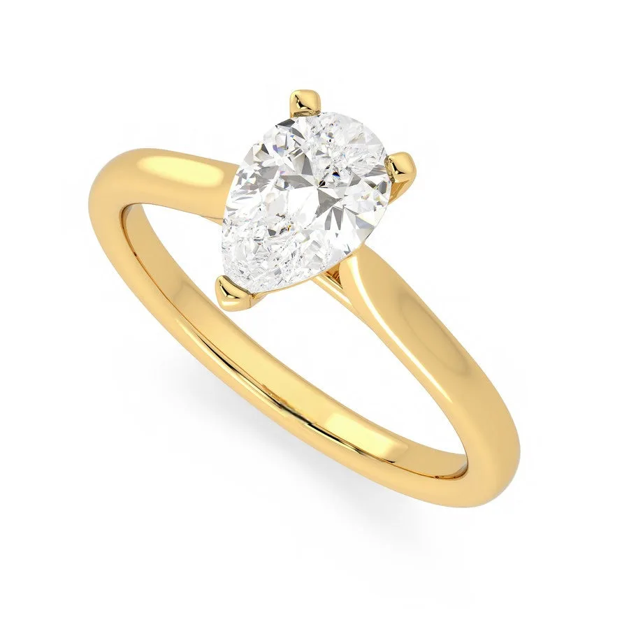 Eden — pear-cut solitaire in yellow gold.