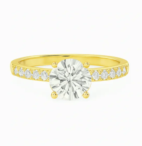 The Ophelia — solitaire ring with pavé shoulders.