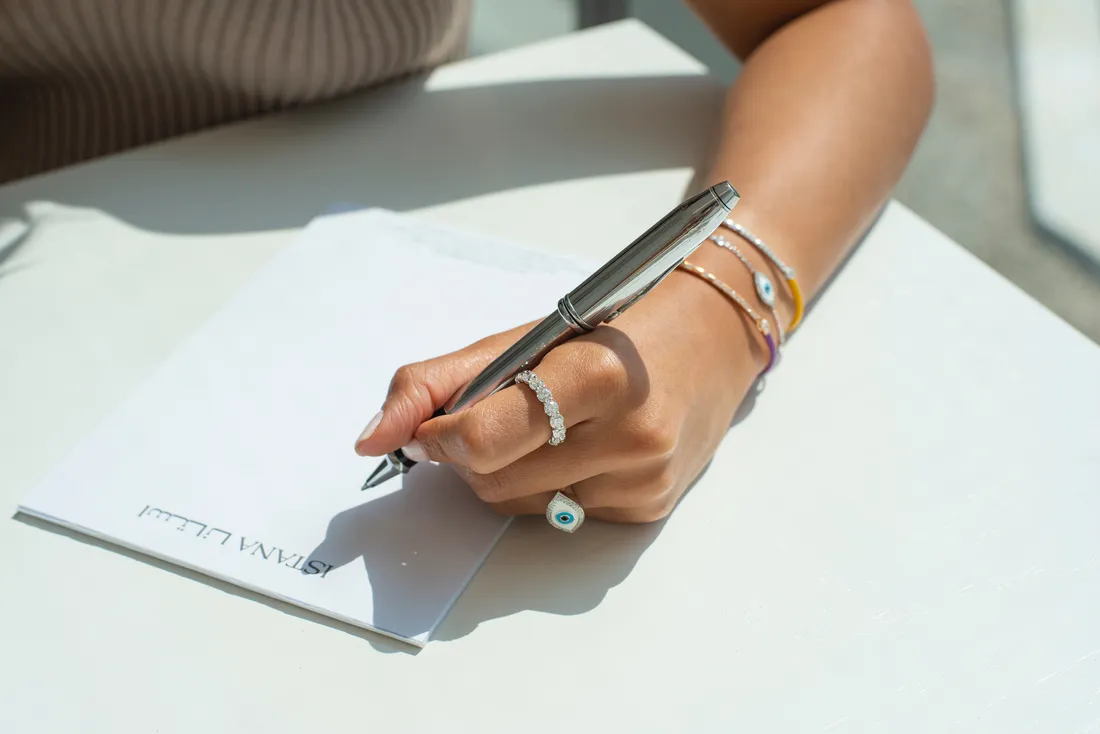 A client at an ISTANA salon, wearing fine diamond jewellery