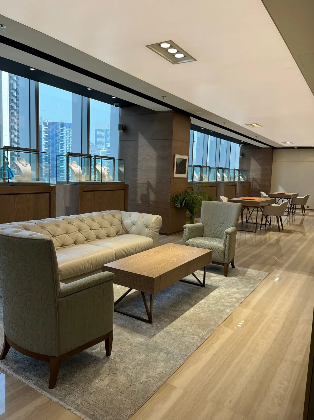 ISTANA salon lounge with display cabinets and seating
