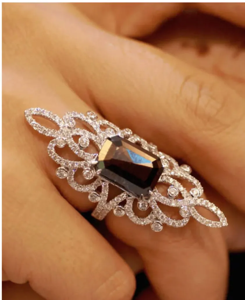 An intricate diamond-set cocktail ring with a fancy-cut centre stone