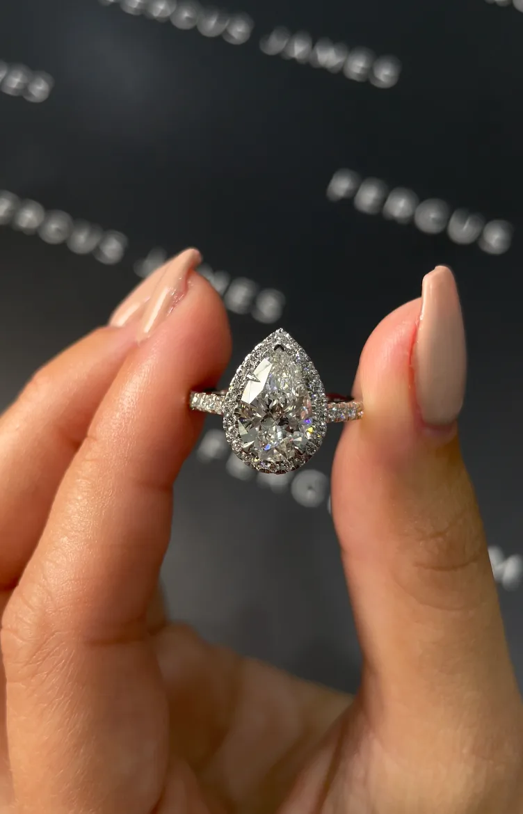 Bespoke cushion-cut diamond ring in yellow gold