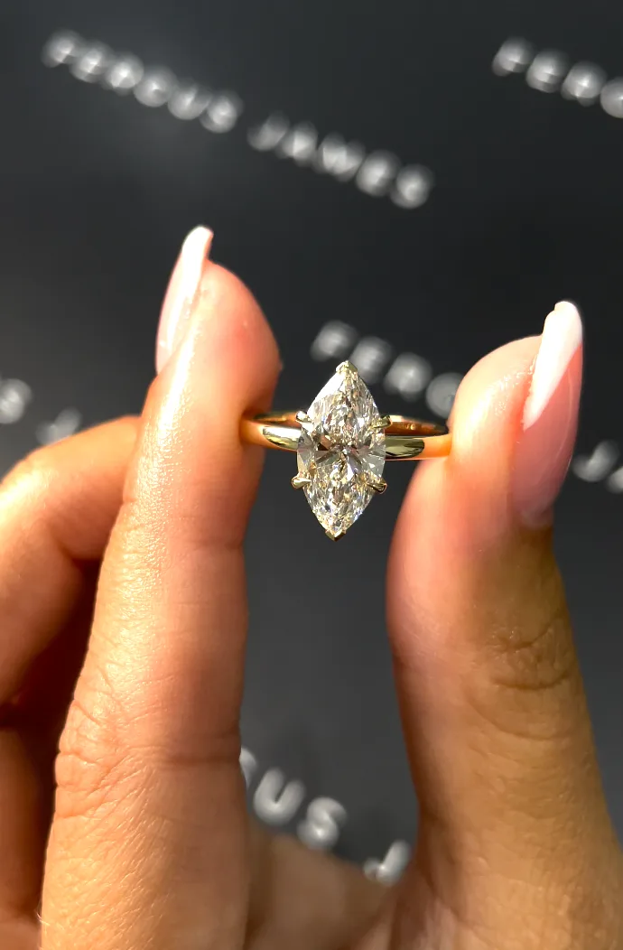Bespoke oval diamond ring in yellow gold