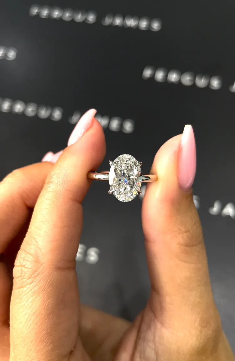 Bespoke pear-cut diamond halo ring