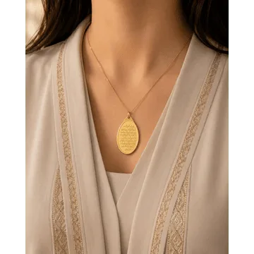 Ayatul Kursi engraved gold pendant on model