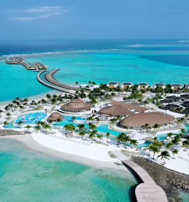 Overwater villas and turquoise lagoon in the Maldives