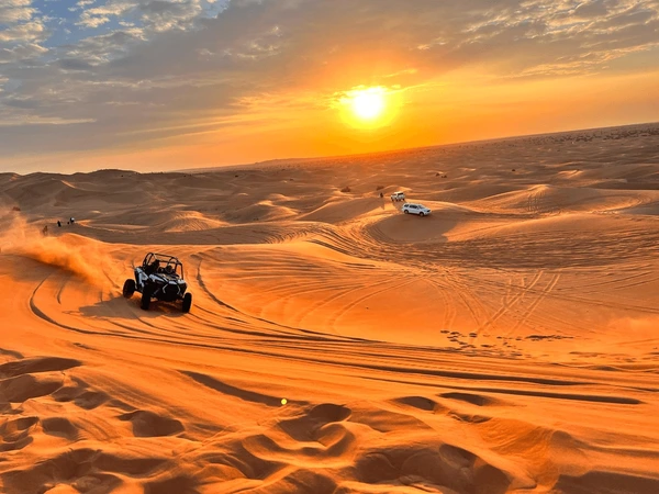 Golden desert dunes near Dubai at sunset