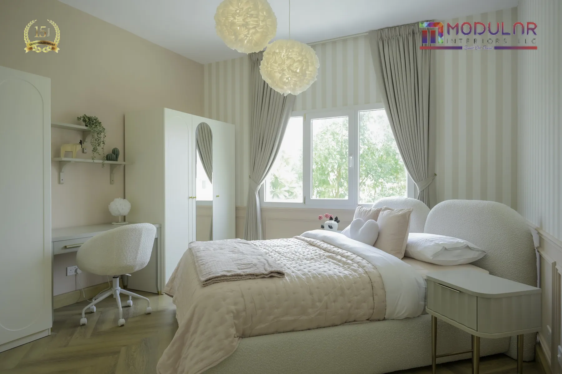 Soft neutral bedroom suite with bespoke wardrobes and study nook