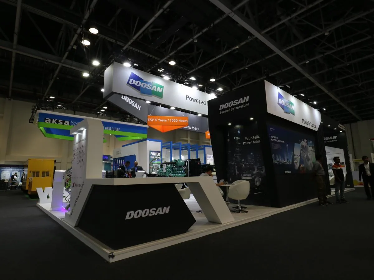 Large custom-built DOOSAN exhibition stand fabricated by Regal Exhibitions at a Dubai trade show