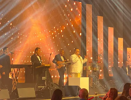 Atmospheric haze and effect lighting on a Mramez Events concert stage
