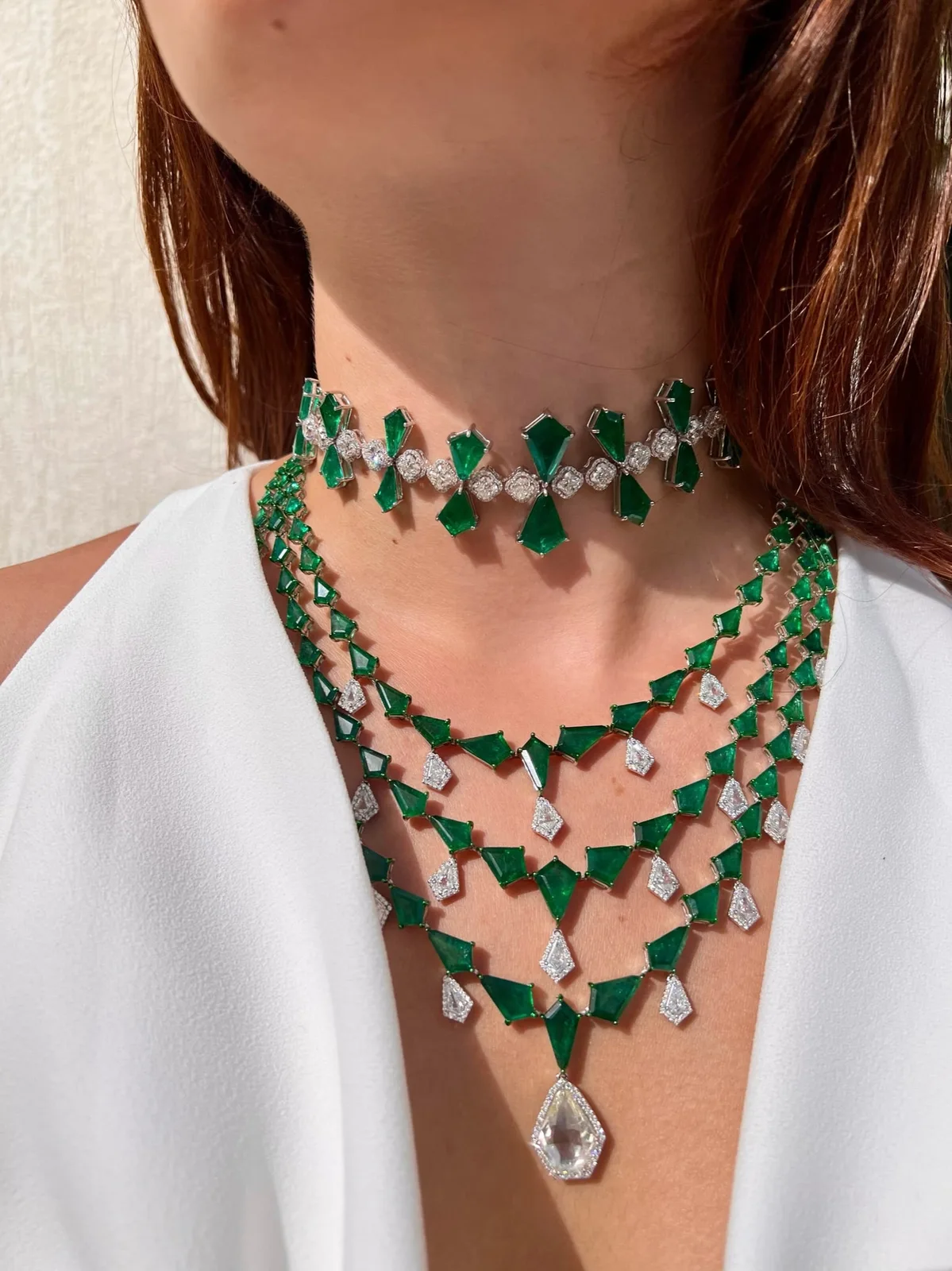 Emerald and diamond layered necklace, worn