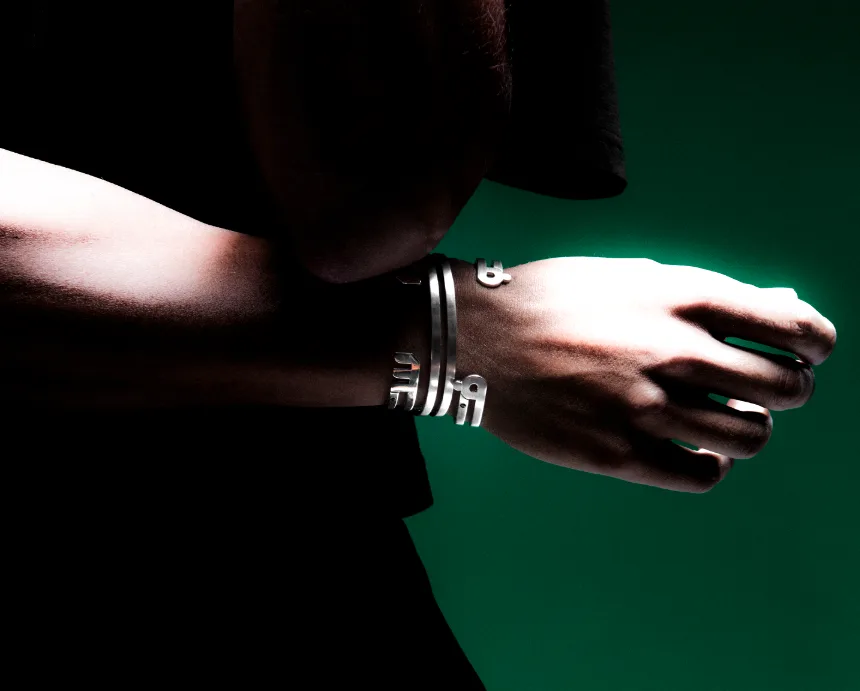 Men's silver calligraphy cuffs