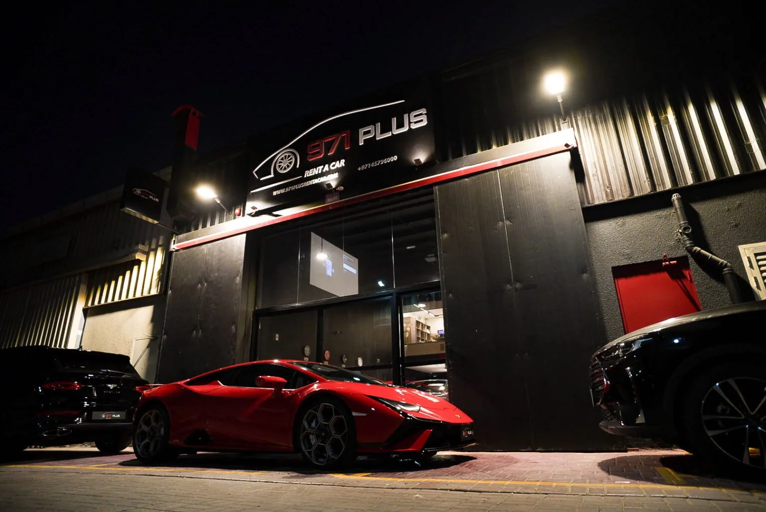 Lamborghini Huracán outside the showroom at night