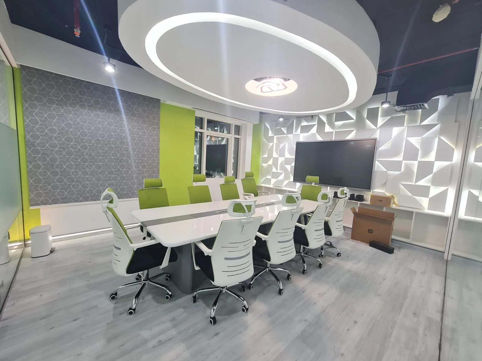 Executive boardroom with 3D feature wall and circular ceiling