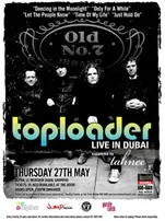 Toploader performing live on a Dubai stage with concert lighting