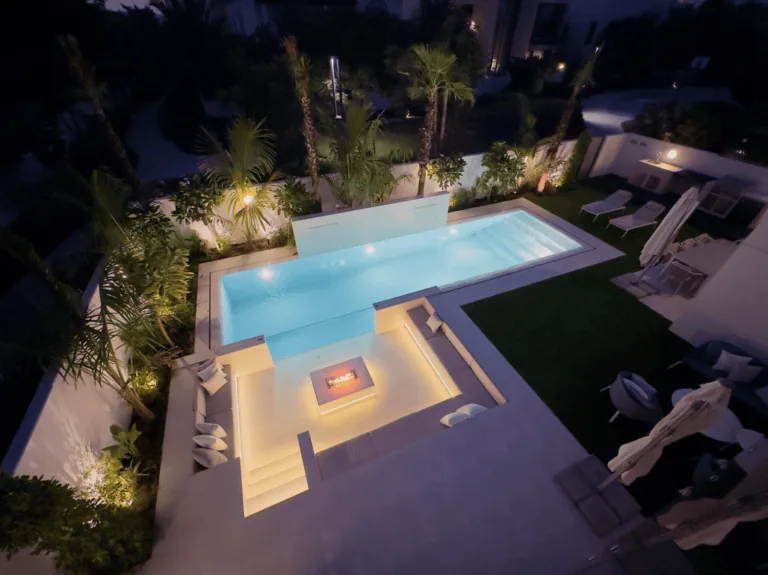 Pool with a central olive-tree island