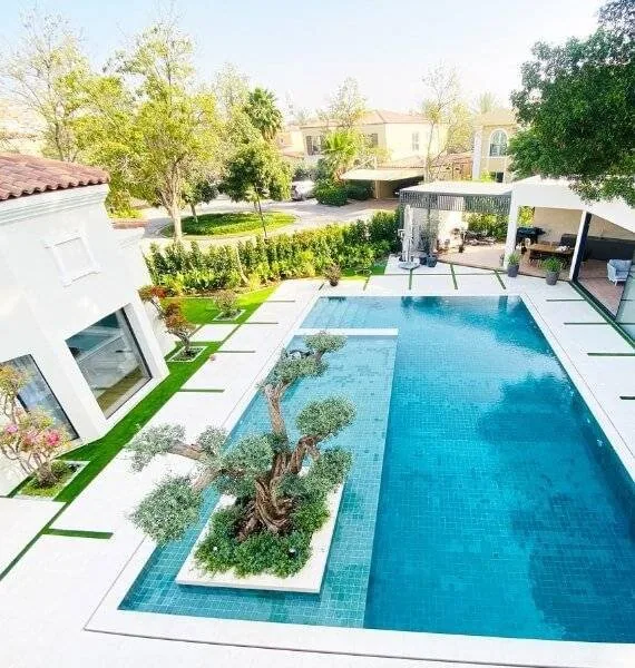 Maintained villa pool and landscaped grounds