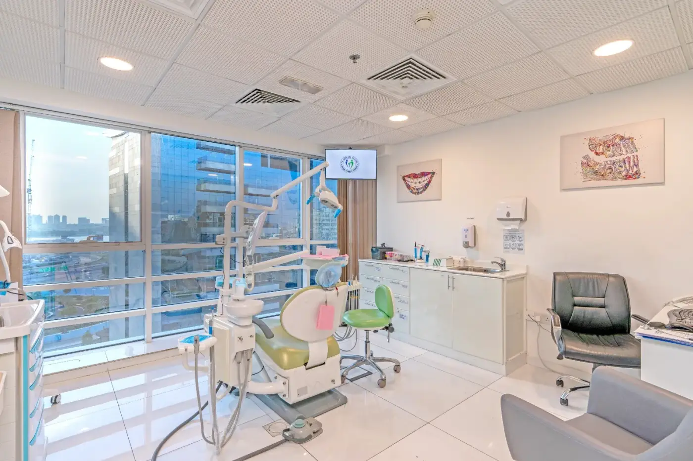 Bright Al Abrah Clinic treatment room overlooking the Deira skyline