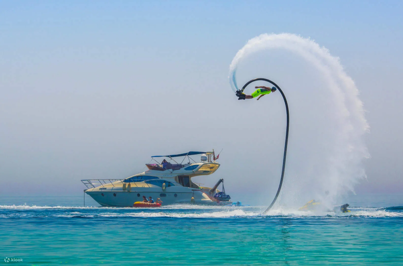 Flyboarding beside a yacht in Dubai