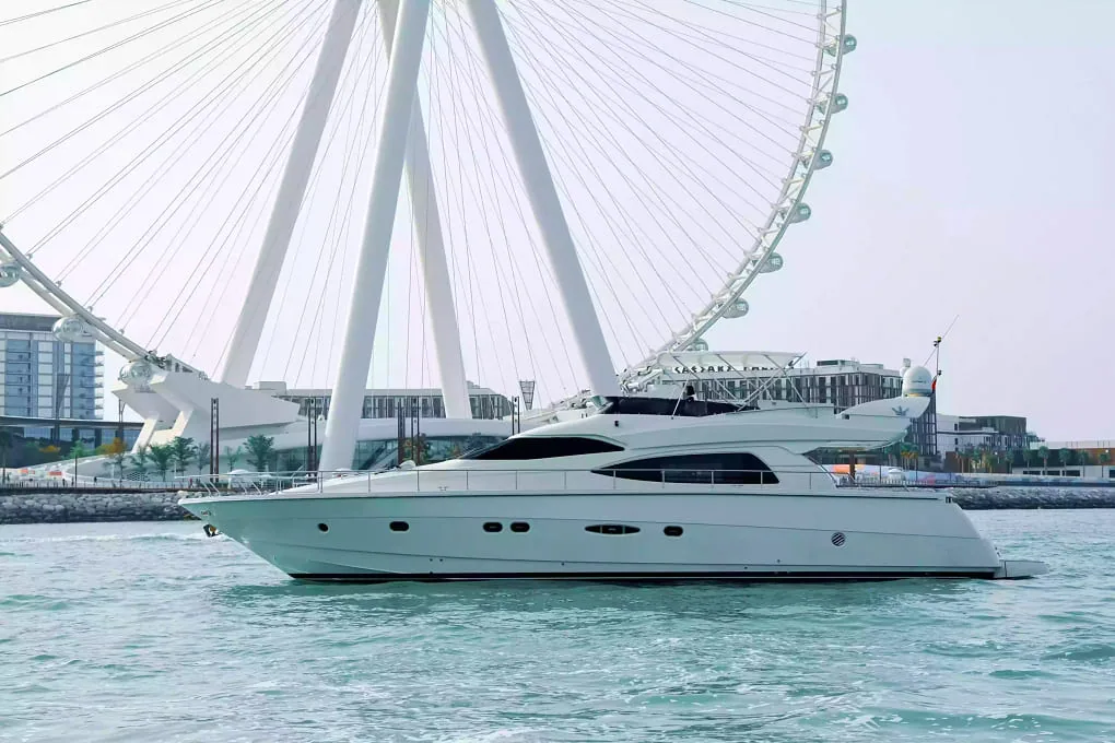 65ft yacht cruising past Dubai high-rises