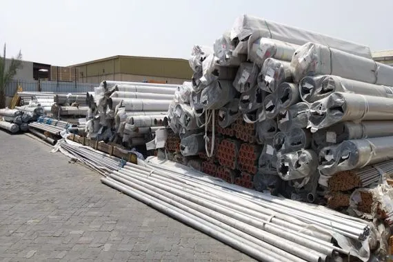 Bundled stainless steel pipe and tube stock held in the yard