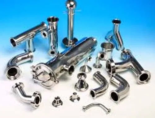 Assortment of stainless steel sanitary and clamp fittings and valves