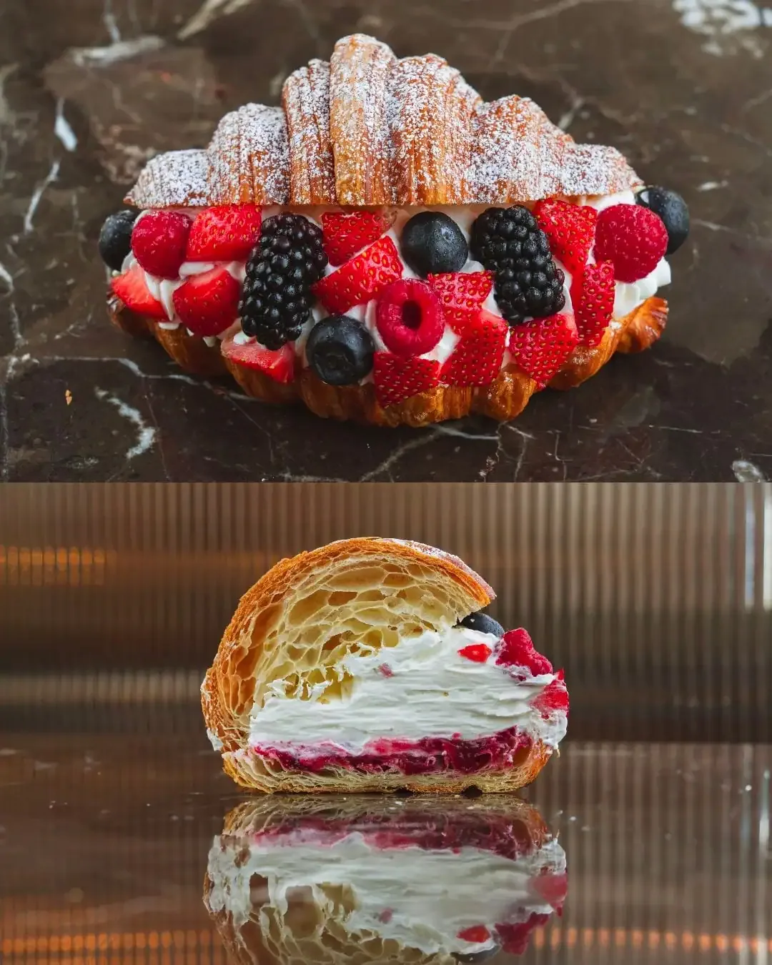 A croissant filled with cream and fresh strawberries, blueberries and blackberries